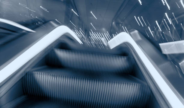 istock Modern station escalator with long exposure 1196481703