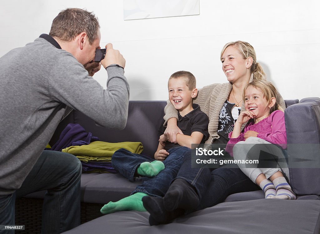 Father taking a photo of his family  30-39 Years Stock Photo