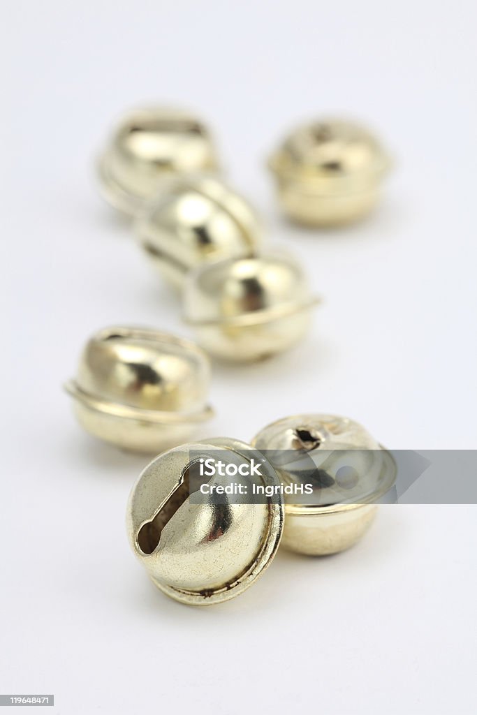 Gold jingle bells  Gold Colored Stock Photo