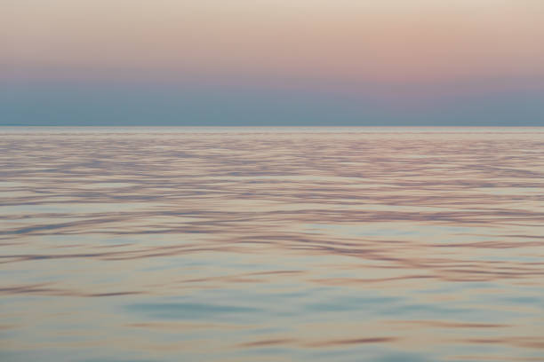 istock Beautiful sunset at sea horizon in dusk 1196486360