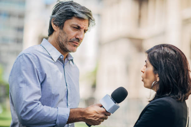 istock News reporter in live broadcasting 1196490515