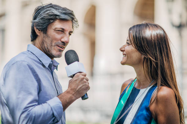 istock News reporter in live broadcasting 1196490523