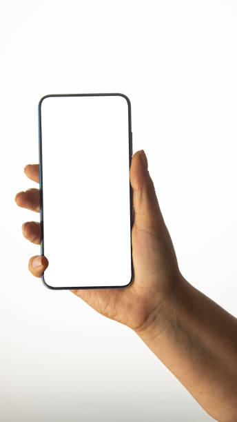istock Hand holding black Smartphone with blank screen on white background 1196493101
