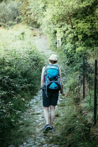 istock Hiker on a trail in the Dolomites, Italy 1196498637