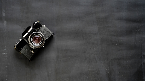old analog film slr camera, photography, vintage photo gear concept