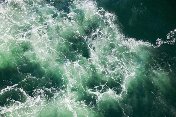 istock blue green water in stormy sea 1196500766