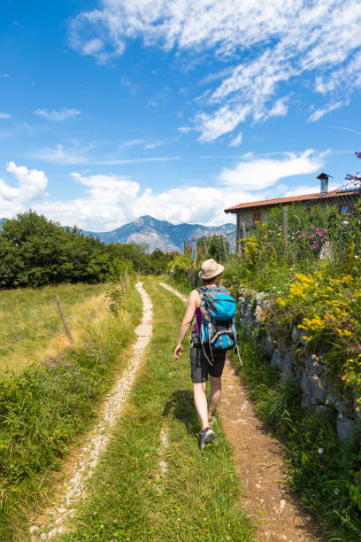 istock Hiker on a trail in the Dolomites, Italy 1196501893