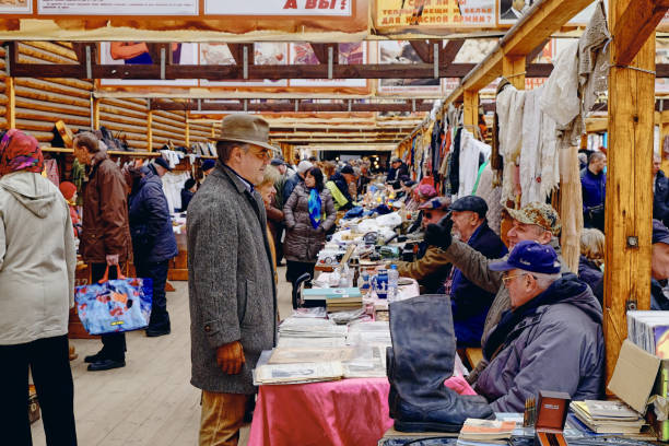 Izmaylovo Market in Moscow, Russia MOSCOW, Russia - April 18, 2015: The Landscape around Izmaylovo Market in Moscow city with many people walking and shopping in the market, Russia russian nesting doll russia doll moscow russia stock pictures, royalty-free photos & images