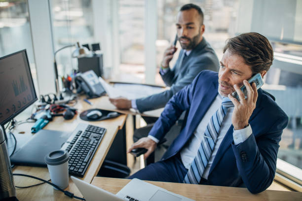 istock Businessmen working together in the office 1196503791