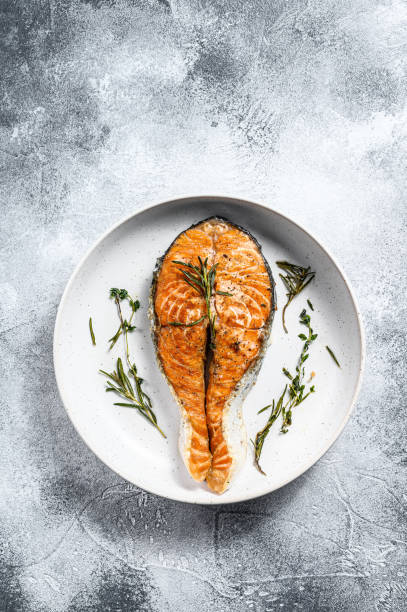 istock Grilled salmon steak. Atlantic fish. Gray background. Top view. Space for text 1196504980