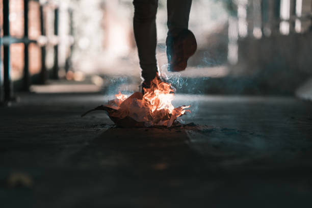 istock A man is walk across the bonfire. 1196506010
