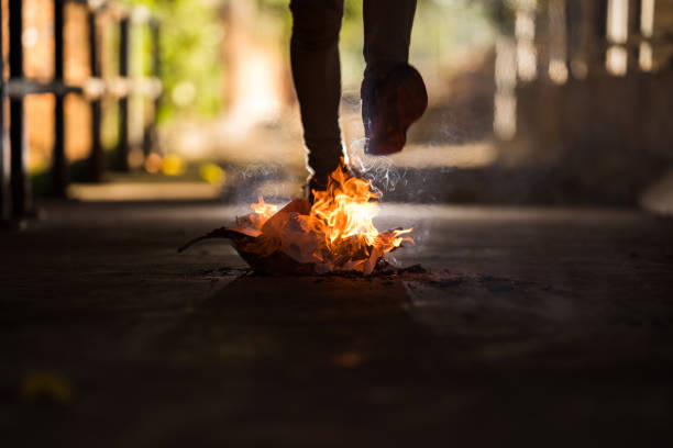 istock A man is walk across the bonfire. 1196506060