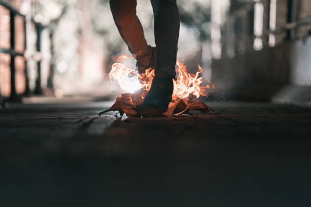 istock A man is walk across the bonfire. 1196506106