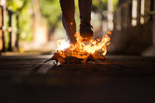 istock A man is walk across the bonfire. 1196506404
