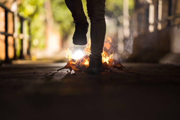 istock A man is walk across the bonfire. 1196506699