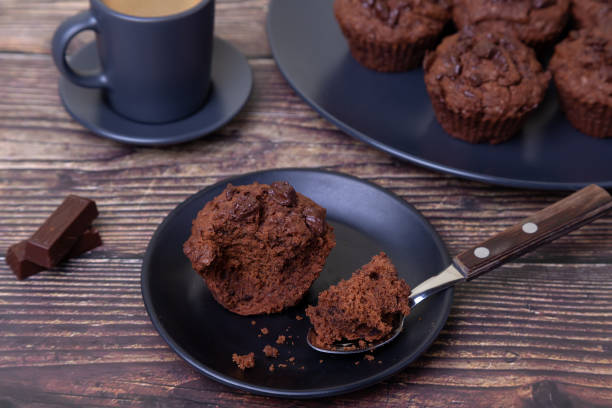 istock Chocolate muffins on a black plate. 1196509840