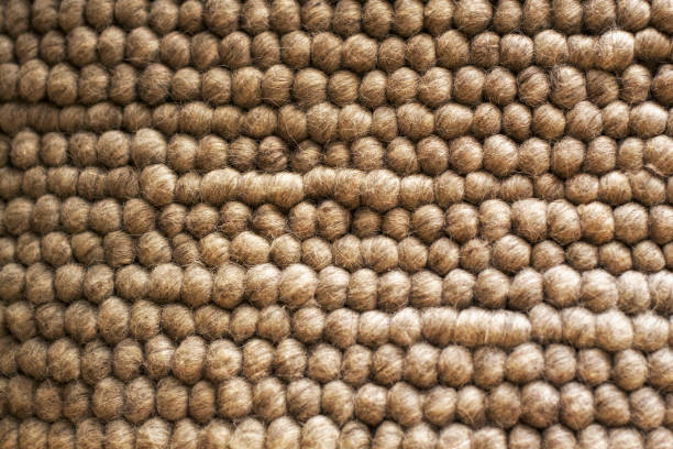 Texture of wool carpet. Handmade carpet fabric texture for background.