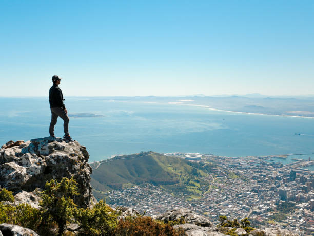 istock a man taking in view on Table Mountain, Cape Town 1196511186