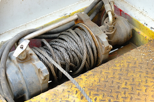 Industrial winch coil with metal cable wire