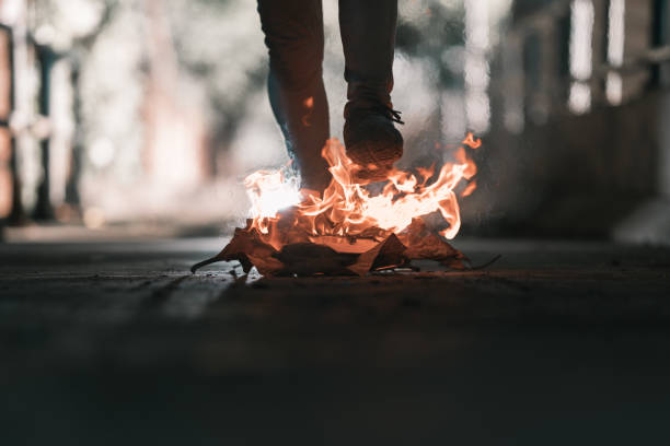 istock A man is walk across the bonfire. 1196513114