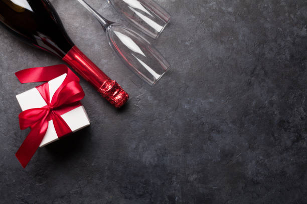 istock Valentines day gift box and champagne 1196514902