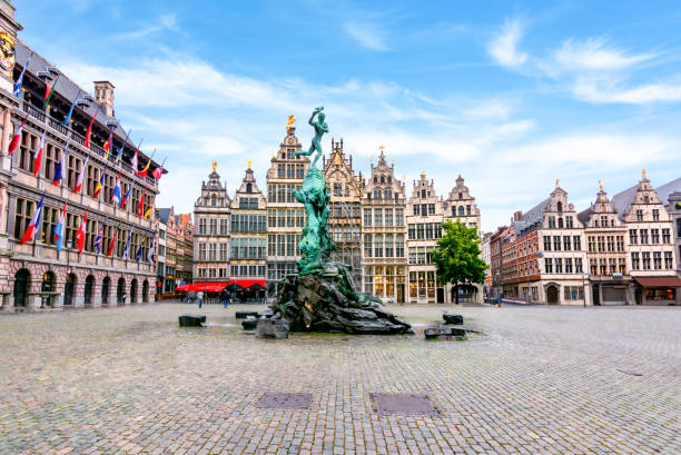 market square in center of antwerp with brabo fountain, belgium - belgium imagens e fotografias de stock