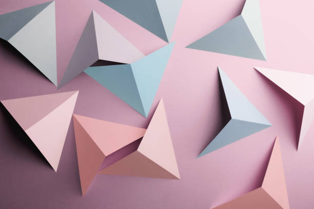 istock Abstract pattern made of colored paper, pink background 1196518283