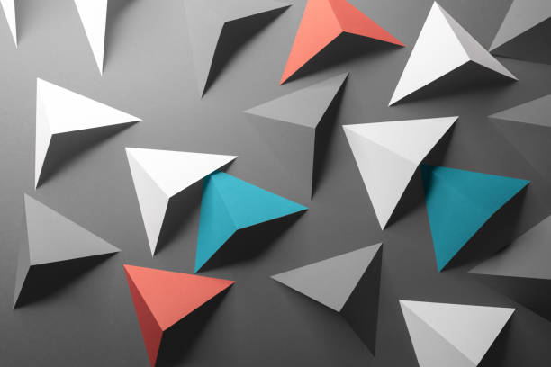 istock Abstract pattern made of colored paper, gray background 1196518331