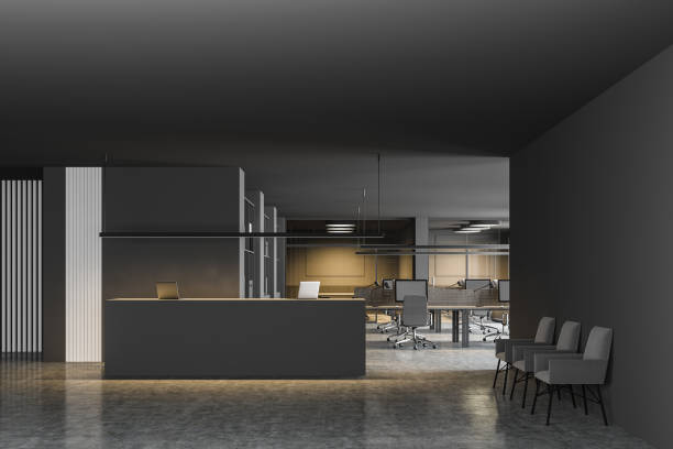 istock Reception and armchairs in gray office interior 1196521743
