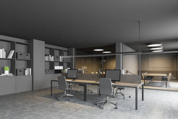 istock Corner of grey open space office with meeting room 1196522309