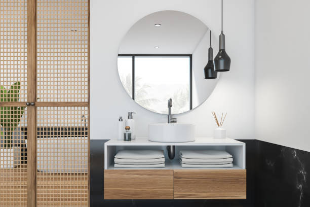 istock Black marble and white bathroom, tub and sink 1196522402