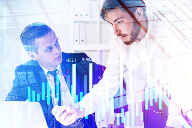 istock Businessmen in office, digital graph 1196522470