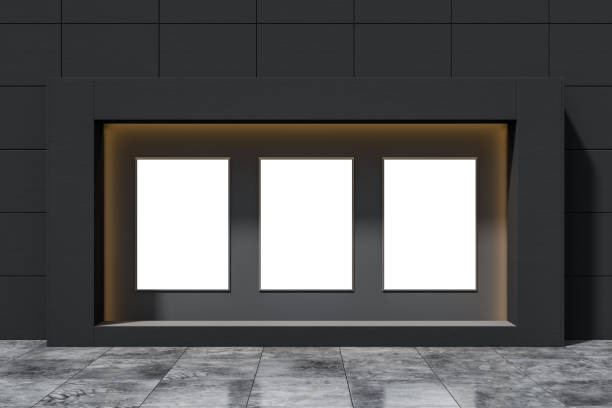 istock Gray shop window with three posters 1196522554