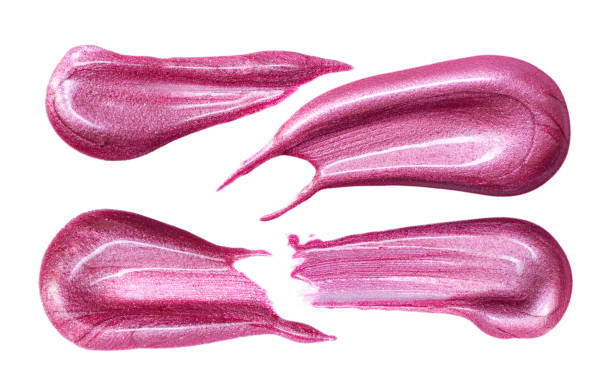 istock Set of different lip glosses smear isolated on white. Smudged makeup product sample. 1196523444