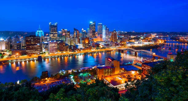 istock Pittsburgh Pennsylvania downtown aerial view night 1196525677