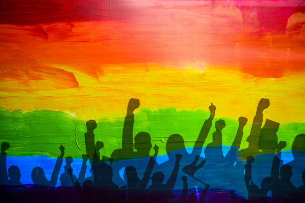 lgbtq pride flag. rainbow color flag. gay and lesbian pride concept. lgbtq - crowd community large group of people protest imagens e fotografias de stock