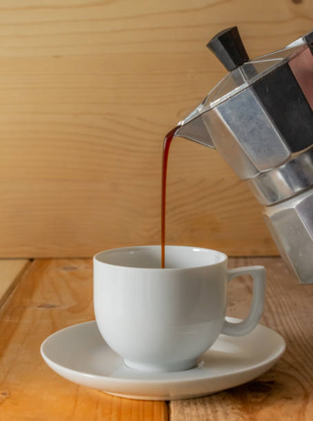 istock coffee poured from a moka into a cup 1196527864