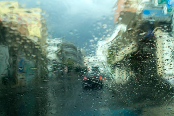 istock Blurred city view during the rain 1196532605