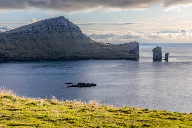 istock Drangarnir is the collective name for two sea stacks 1196534313