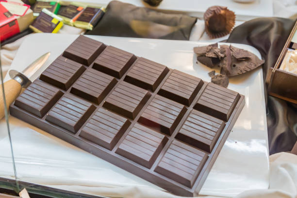 istock Chocolate bar on the window shop. chocolate shop 1196535559