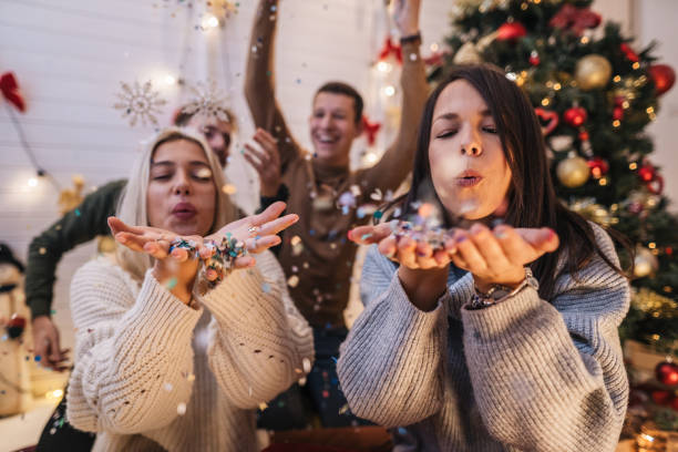 istock Cheerful friends celebrating New Year 1196537441