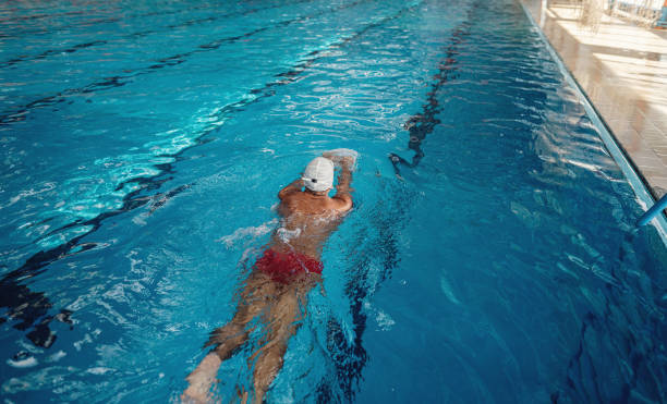 istock Mature swimmer swimming 1196537476