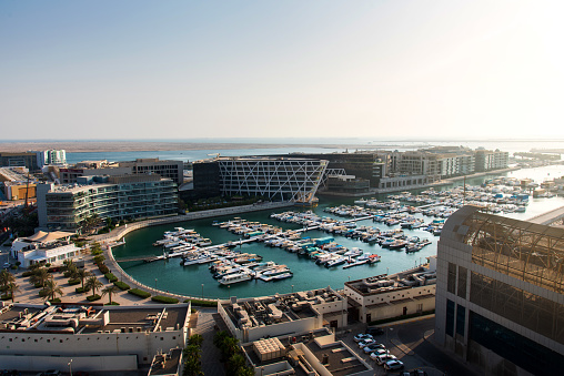 Abu Dhabi, United Arab Emirates - September 29, 2019: Al Marasy Marina view with luxury yachts in Abu Dhabi, Al Bateen area