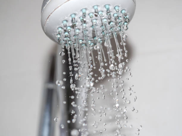 istock drops of water from shower head 1196545359