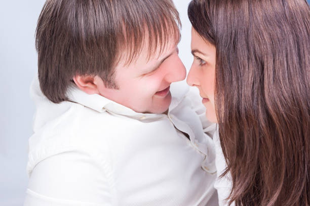 Loving couple close up portrait outdoors