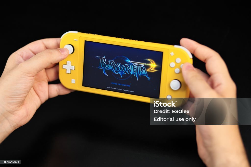 Nintendo Switch Lite Is Nintendos Latest Entry Into Handheld At 19999 Switch Lite Is Available In Yellow Color Stock Photo - Download Image Now - iStock