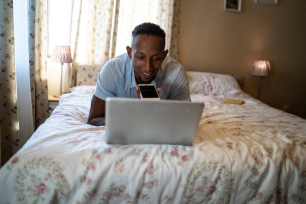 istock Young african man at home 1196551569