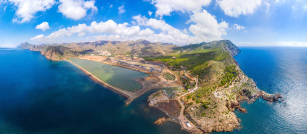 istock panoramic aerial view on the Rocky cape surrounded by turquoise water 1196562205