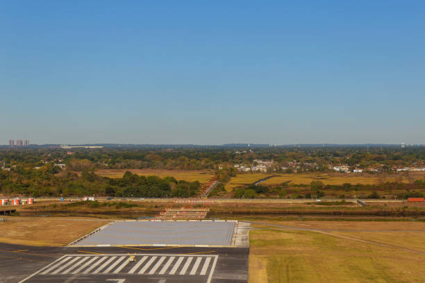 istock Airplane landing on the track 1196570741