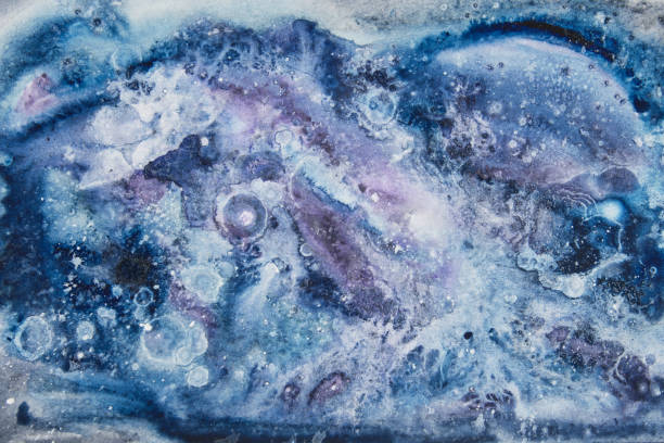 istock Watercolor texture with a space look 1196570929